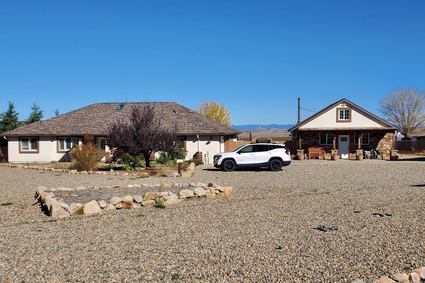Single-level ranch home on two private acres